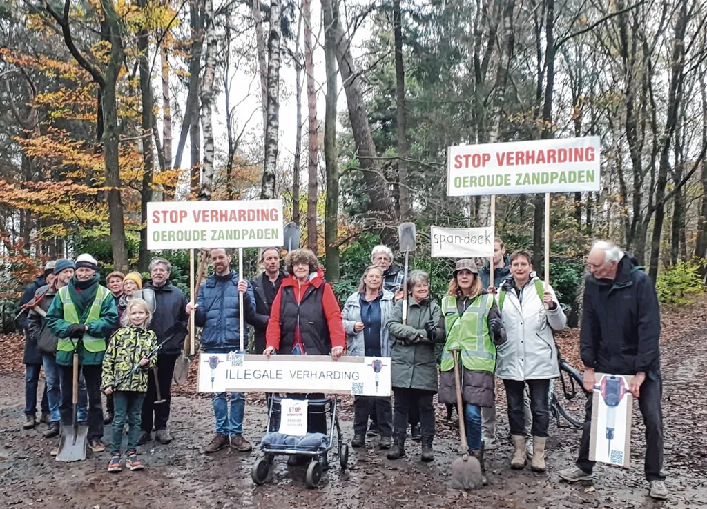 Met de schop in de hand op het voormalige zandpad